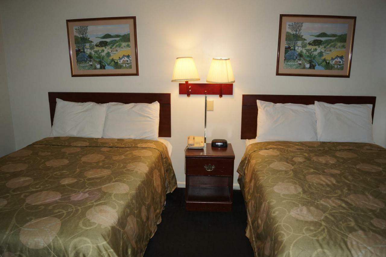 Country Squire Inn And Suites Coshocton Экстерьер фото